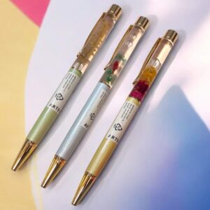 ARTEBENE - Penna a sfera con fiori colorati e dettagli glitterati